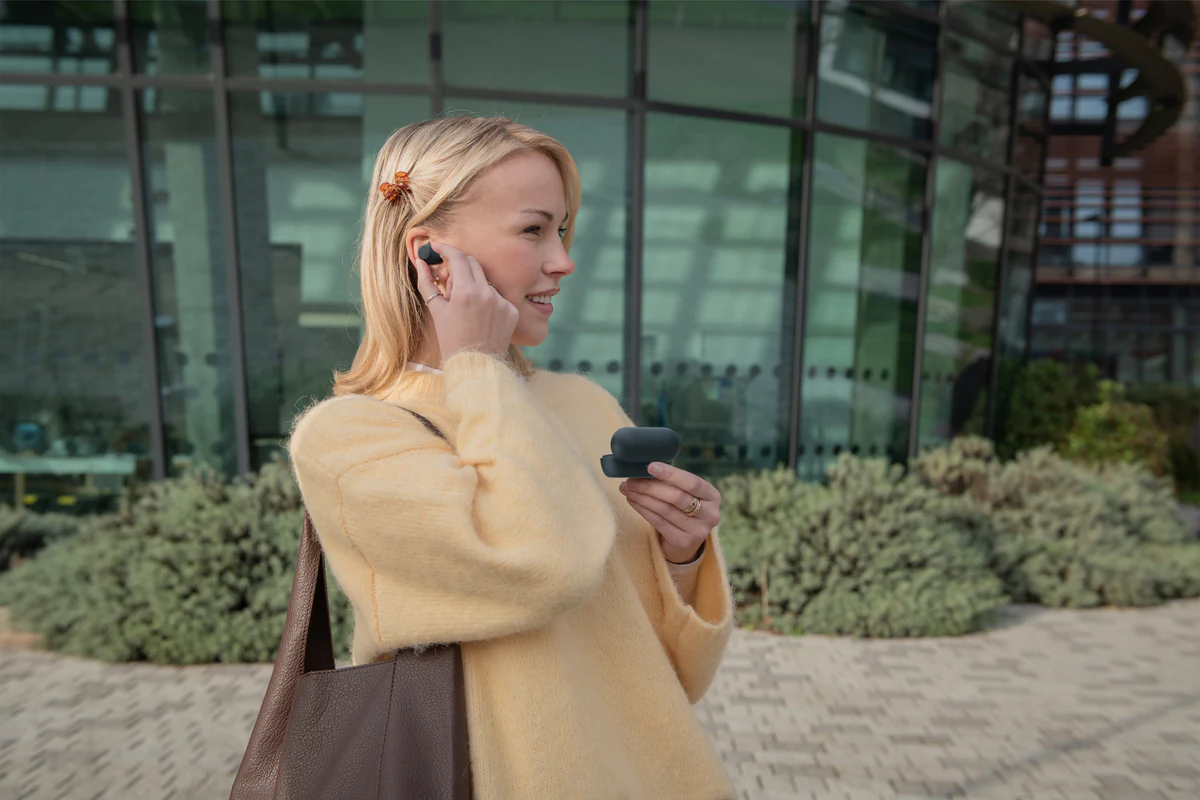 Lifestyle render, Sony WF-C710 wireless earbuds in use