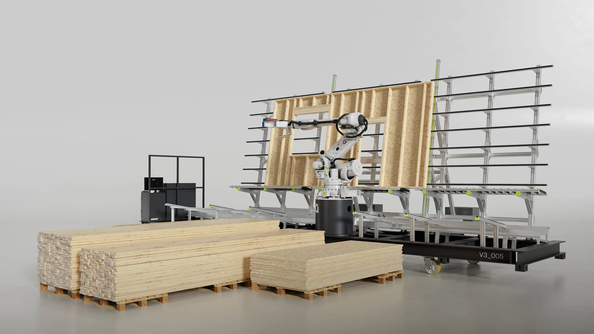 AUAR robotic arm beside timber stacks and a partly assembled wall panel