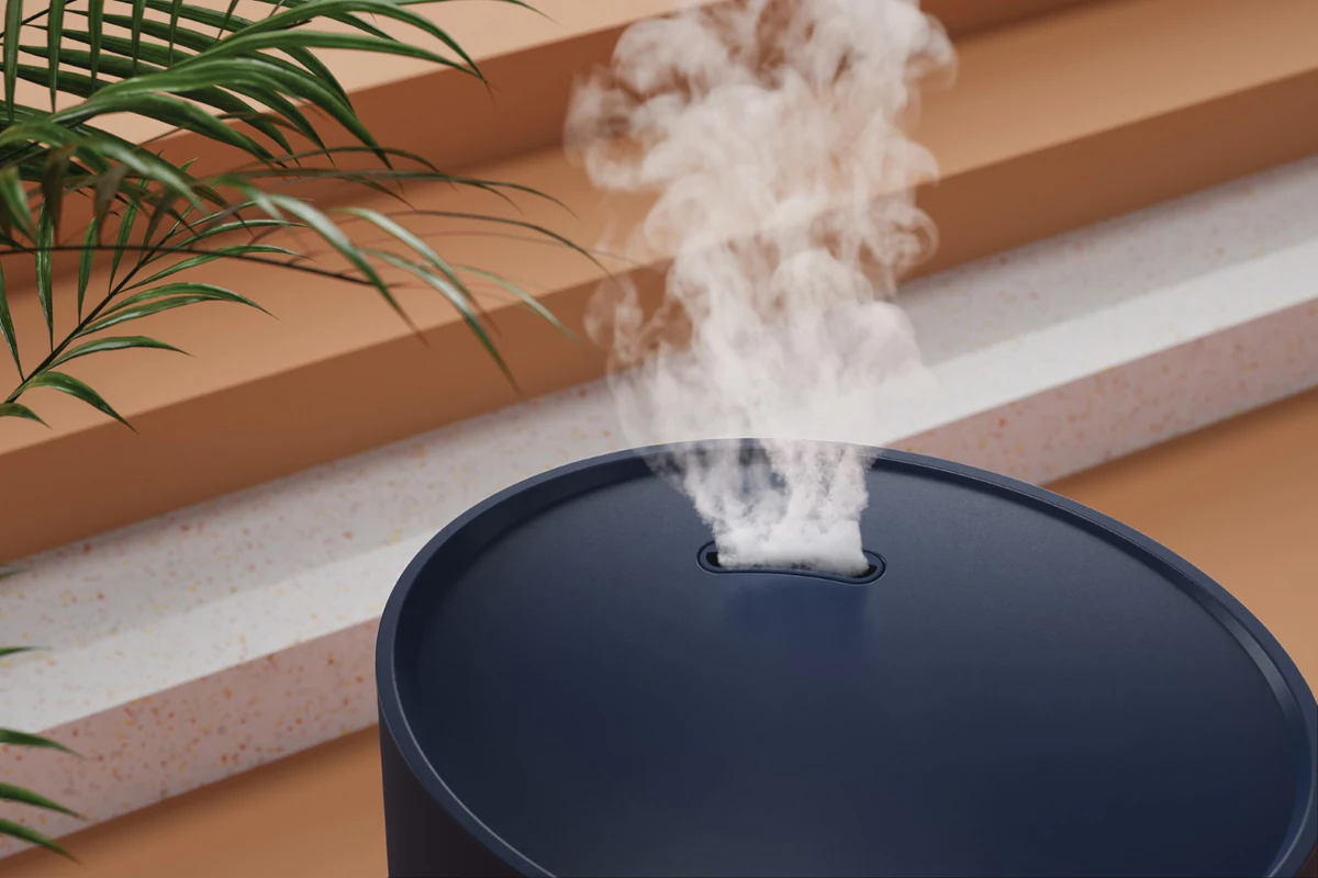 Duux Neo humidifier, Deep Blue colourway with simulated mist