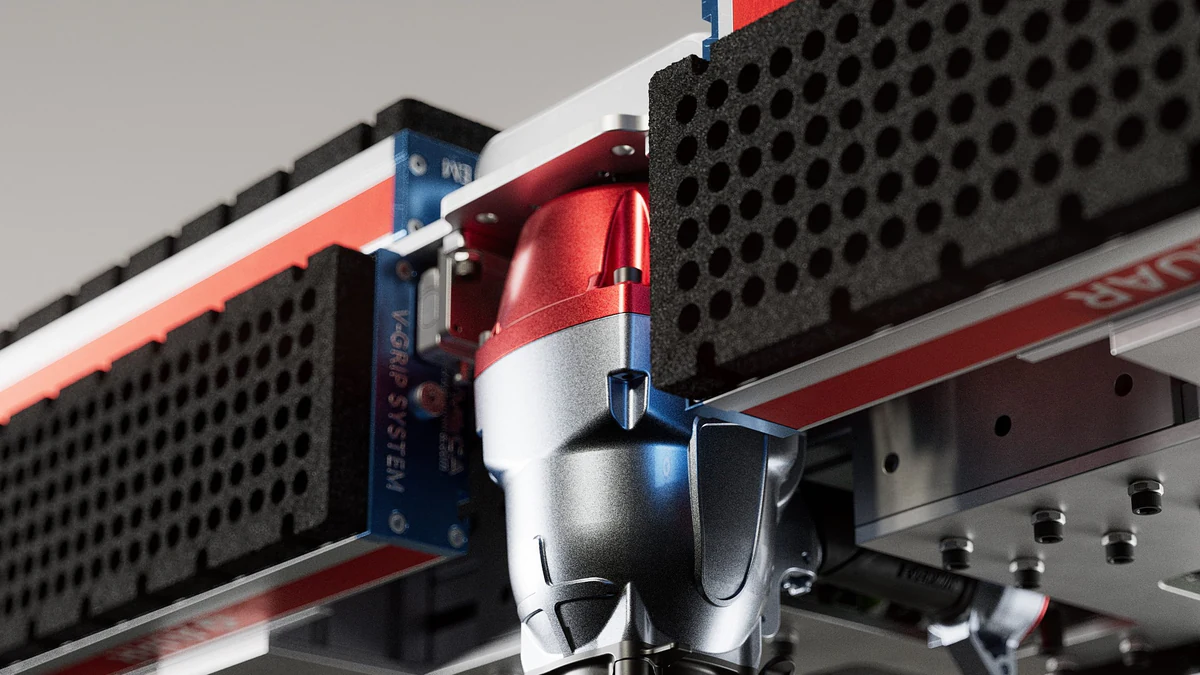 AUAR MicroFactory macro render, V-GRIP SYSTEM gripper detail with red and blue material accents